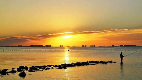 Amanecer con Pescador