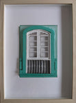 Ventana de dos hojas con baranda torneada